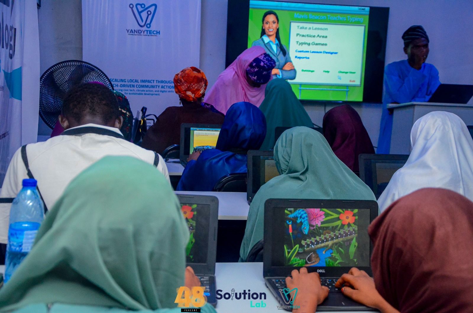 Young people participating in a Technology to the Locals digital skills training session